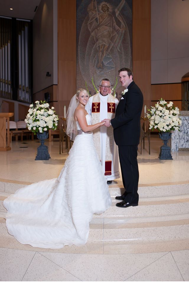 Here's a pic with our awesome officiant, Father Bierschenk! 